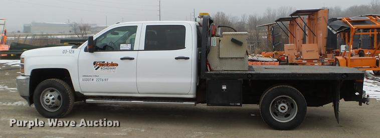 image for item DD0741 2015 Chevrolet Silverado 3500HD Crew Cab flatbed pickup truck