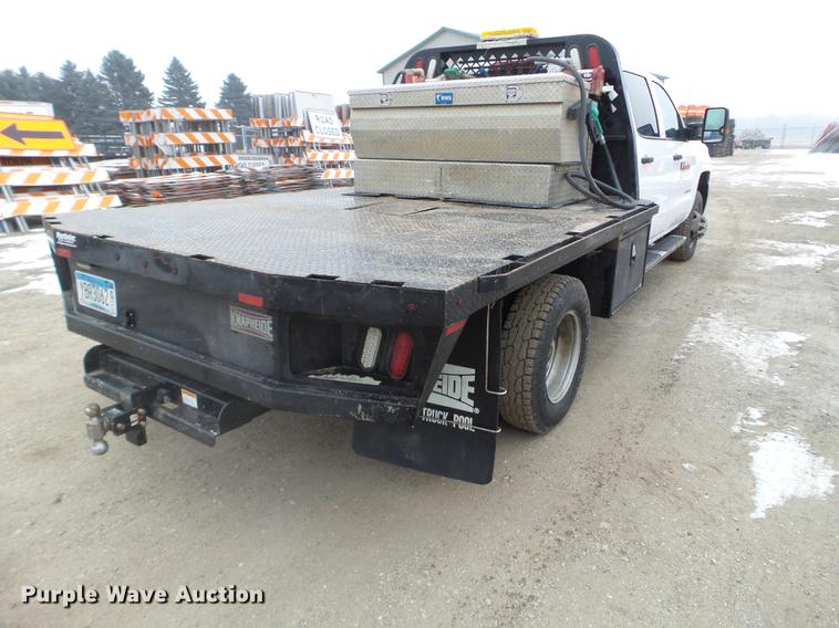 image for item DD0741 2015 Chevrolet Silverado 3500HD Crew Cab flatbed pickup truck
