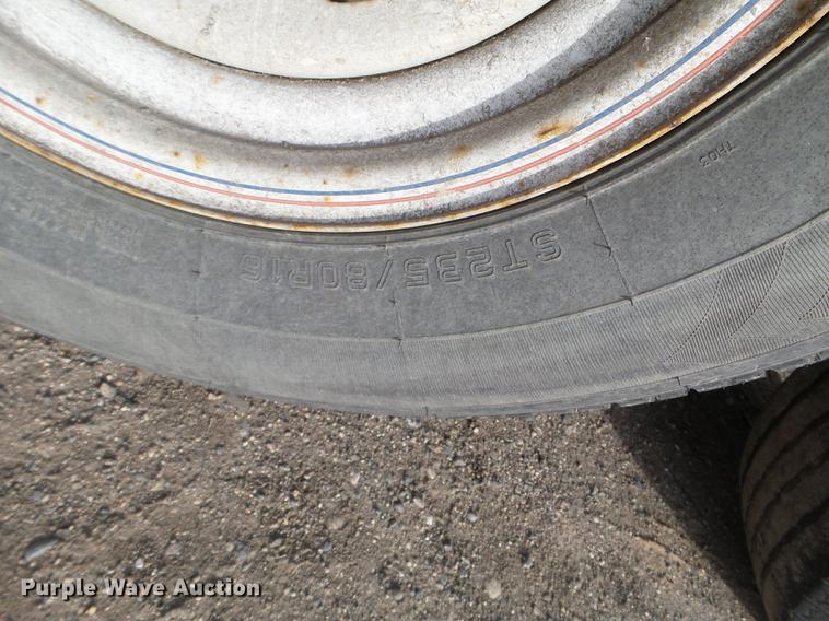 image for item DD0749 2012 PJ Trailers tilt deck utility trailer