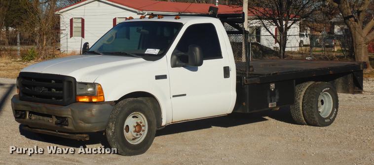 image for item DD3563 2001 Ford F350 Super Duty flatbed pickup truck