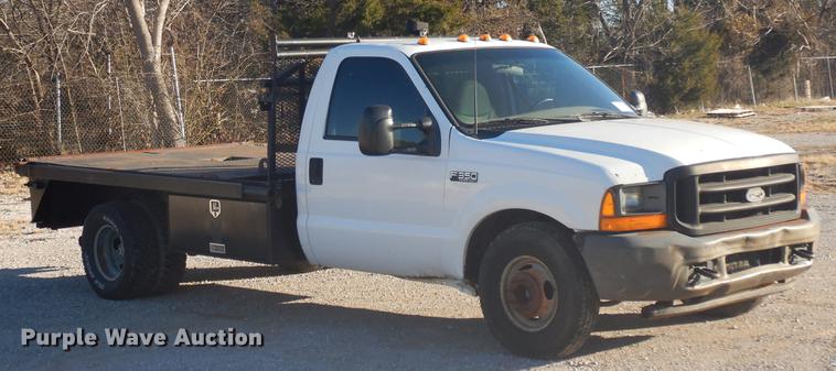 image for item DD3563 2001 Ford F350 Super Duty flatbed pickup truck