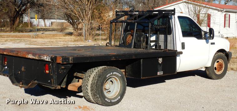 image for item DD3563 2001 Ford F350 Super Duty flatbed pickup truck