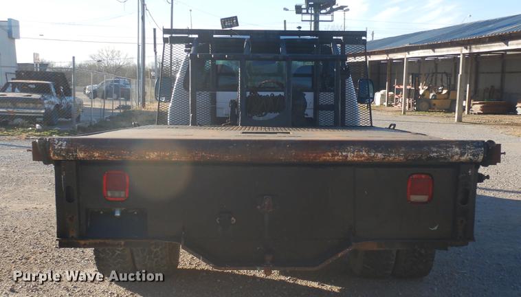 image for item DD3563 2001 Ford F350 Super Duty flatbed pickup truck