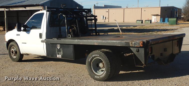 image for item DD3563 2001 Ford F350 Super Duty flatbed pickup truck