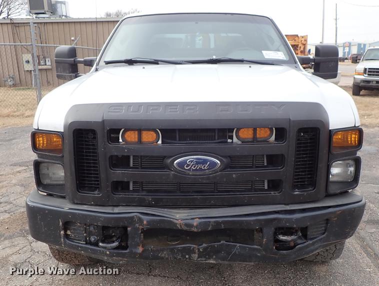 image for item DF8673 2008 Ford F250 Super Duty Crew Cab utility bed pickup truck