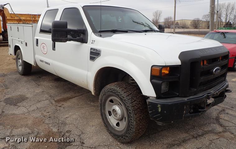 image for item DF8673 2008 Ford F250 Super Duty Crew Cab utility bed pickup truck