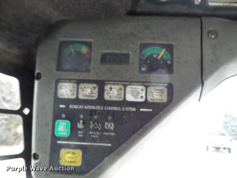 image for item EW9862 1999 Bobcat 873 skid steer