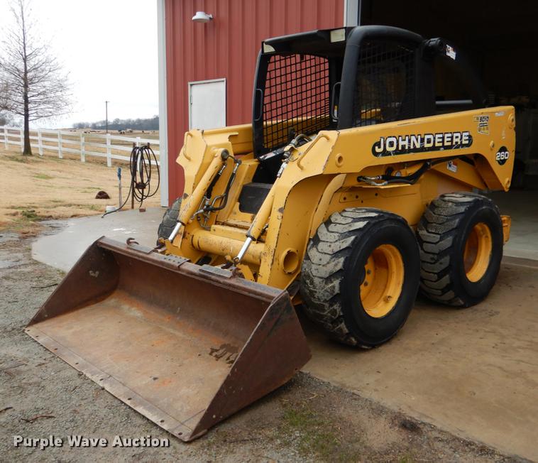 image for item BE9311 2000 John Deere 260 skid steer