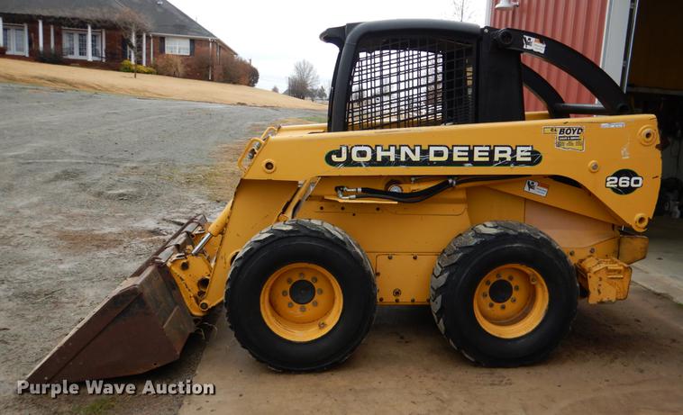 image for item BE9311 2000 John Deere 260 skid steer