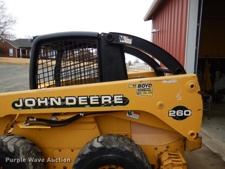 image for item BE9311 2000 John Deere 260 skid steer