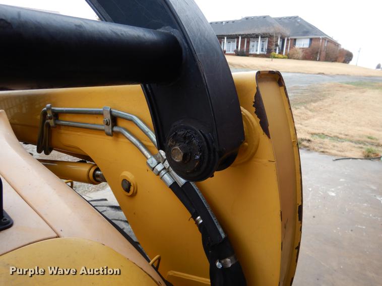 image for item BE9311 2000 John Deere 260 skid steer