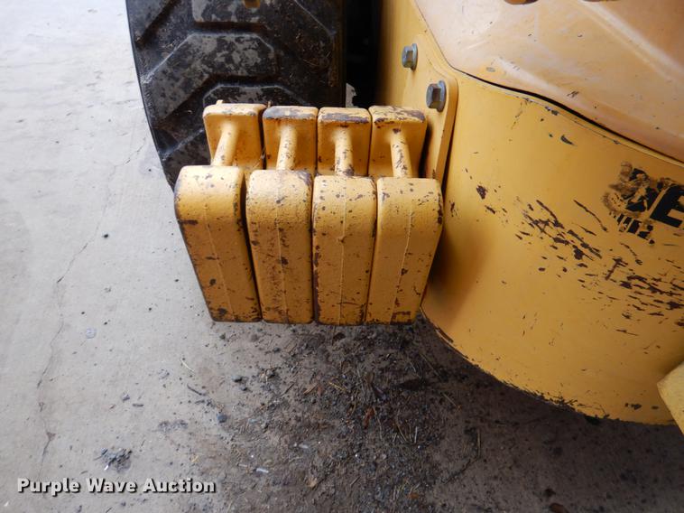 image for item BE9311 2000 John Deere 260 skid steer