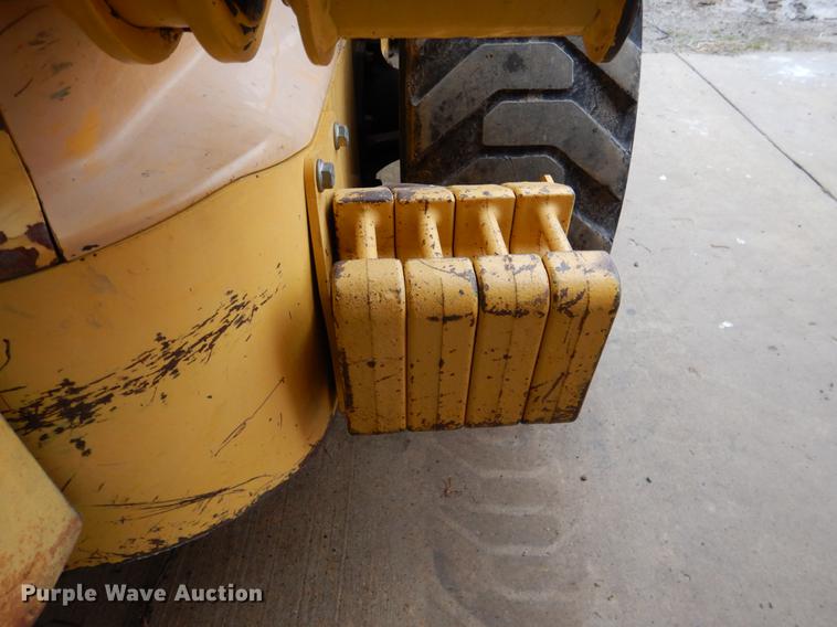 image for item BE9311 2000 John Deere 260 skid steer