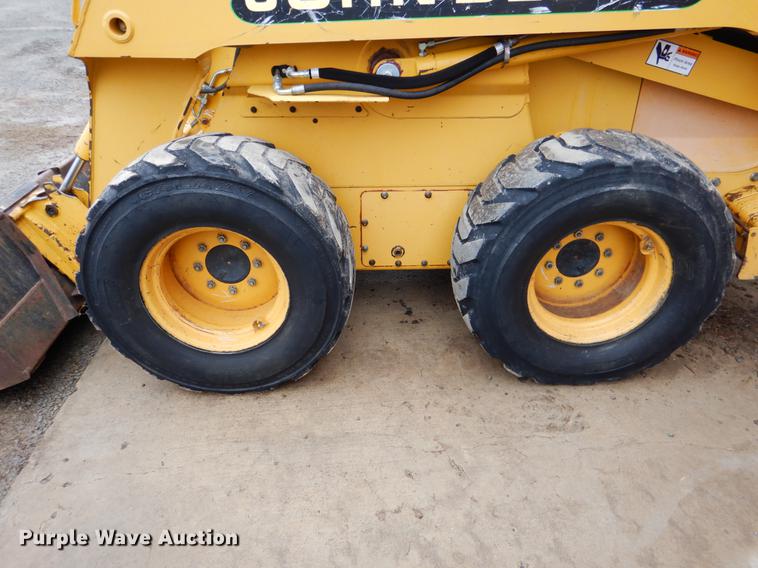 image for item BE9311 2000 John Deere 260 skid steer