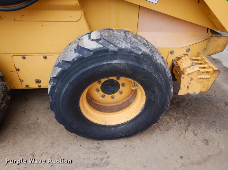 image for item BE9311 2000 John Deere 260 skid steer