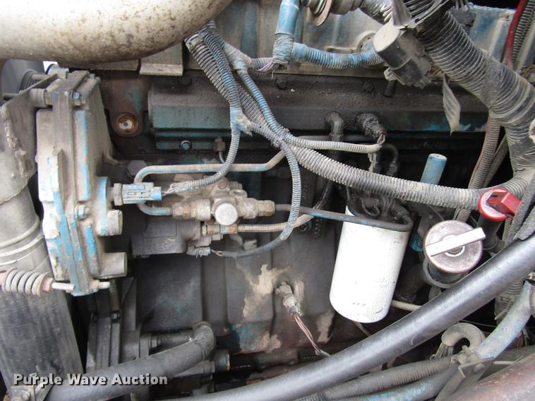 image for item DB6992 1997 International 4700 rollback truck