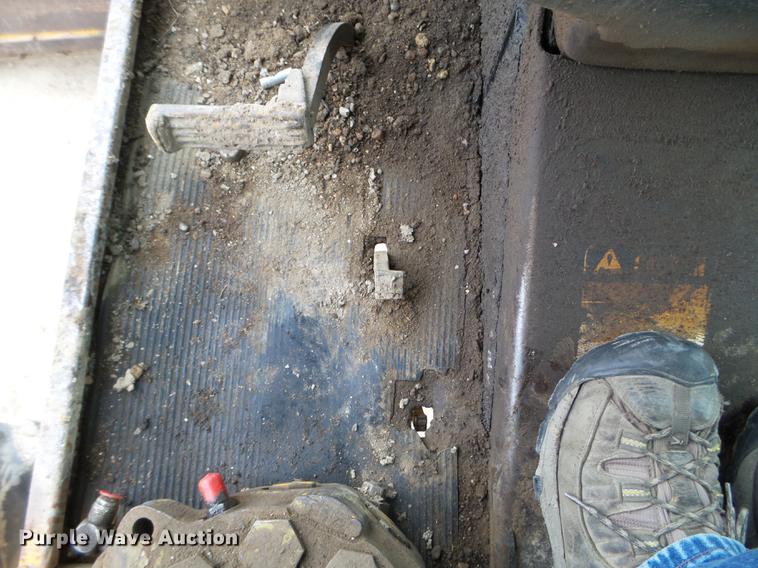 image for item EJ9000 John Deere 570A motor grader