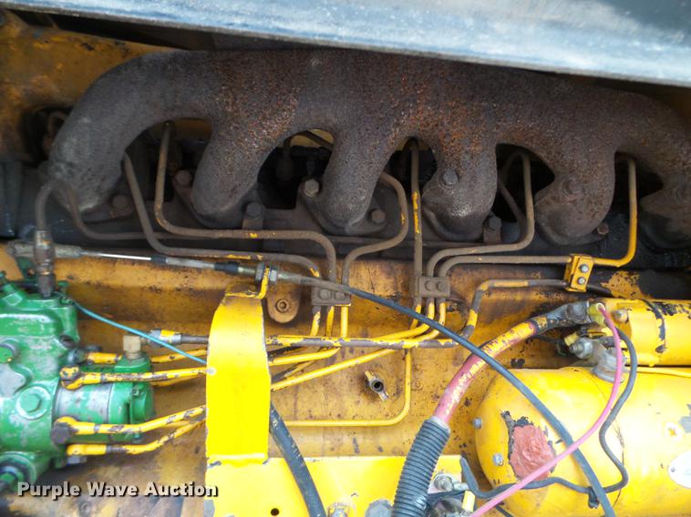 image for item EJ9000 John Deere 570A motor grader