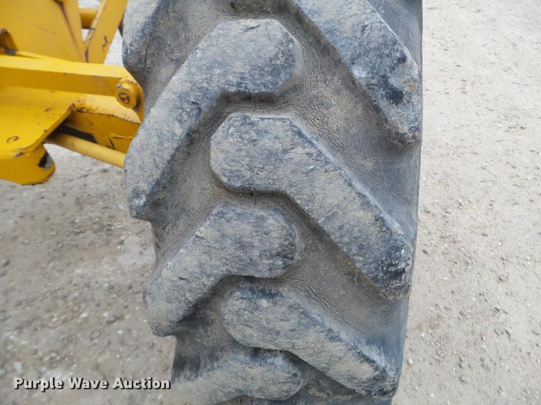 image for item EJ9000 John Deere 570A motor grader