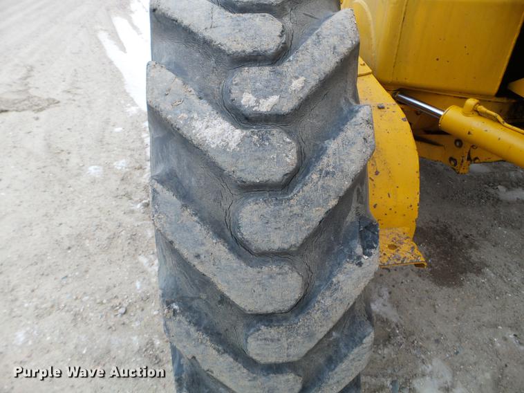 image for item EJ9000 John Deere 570A motor grader