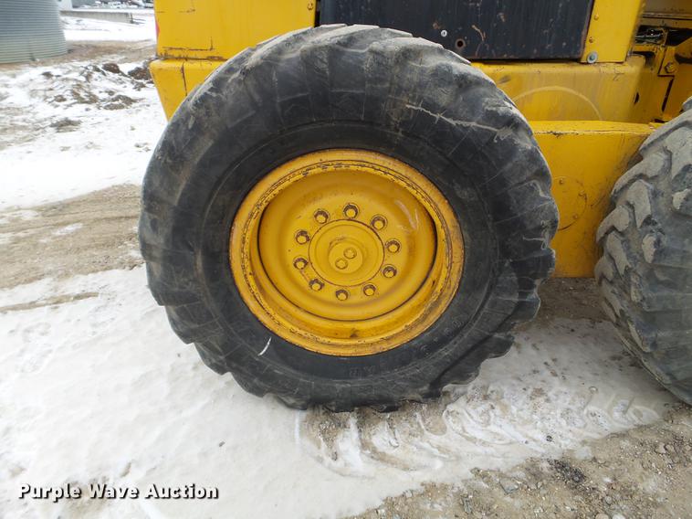 image for item EJ9000 John Deere 570A motor grader