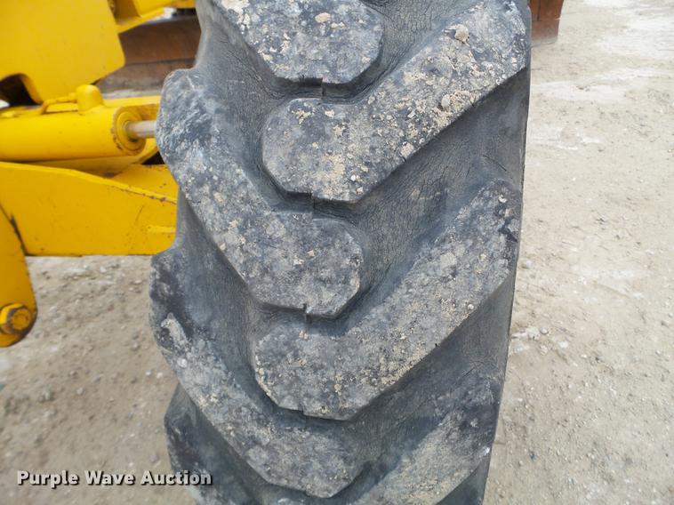 image for item EJ9000 John Deere 570A motor grader