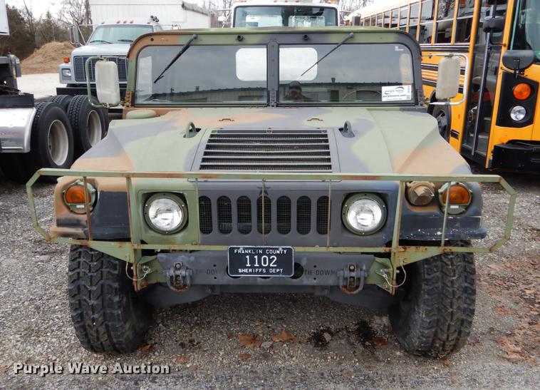 image for item DE5979 1981 Am General flatbed truck