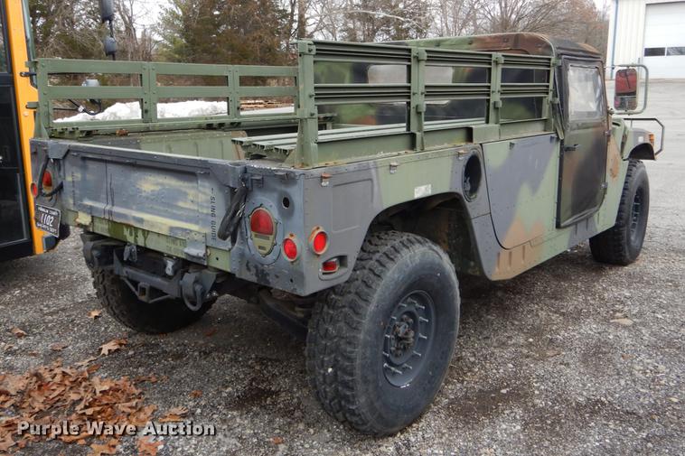 image for item DE5979 1981 Am General flatbed truck