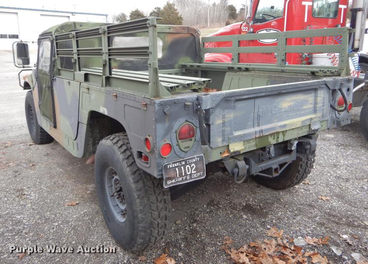 image for item DE5979 1981 Am General flatbed truck