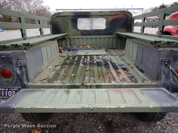 image for item DE5979 1981 Am General flatbed truck