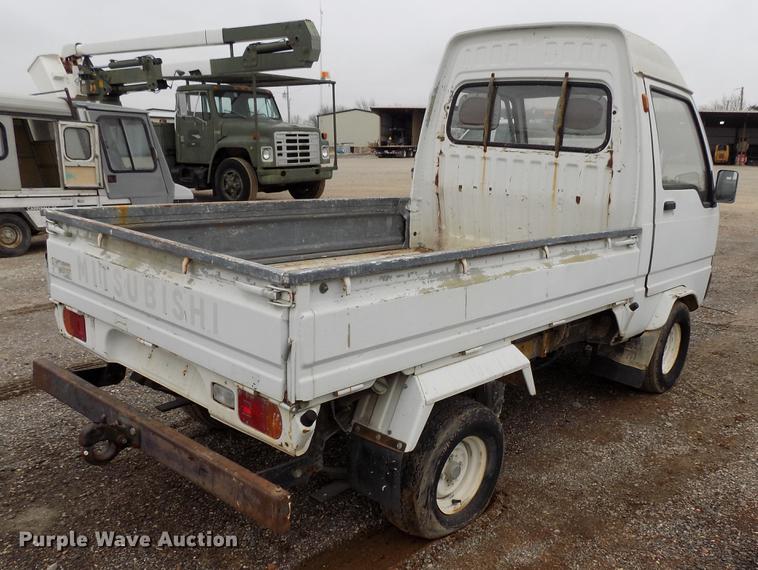 image for item FQ9207 2001 Mitsubishi U14TQHPDL2M flatbed pickup truck