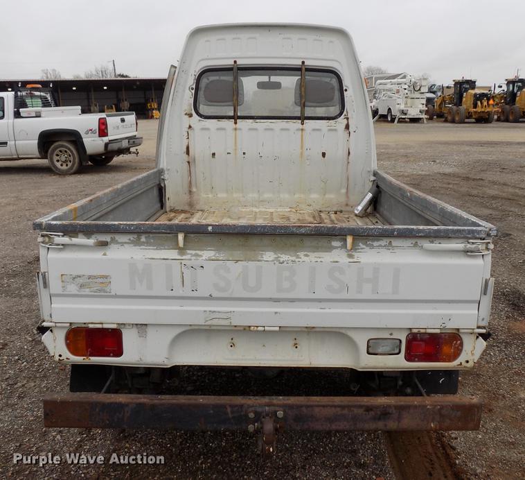 image for item FQ9207 2001 Mitsubishi U14TQHPDL2M flatbed pickup truck