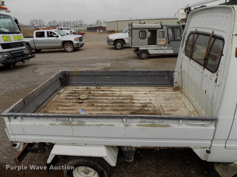 image for item FQ9207 2001 Mitsubishi U14TQHPDL2M flatbed pickup truck