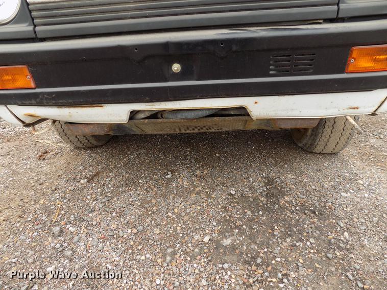 image for item FQ9207 2001 Mitsubishi U14TQHPDL2M flatbed pickup truck