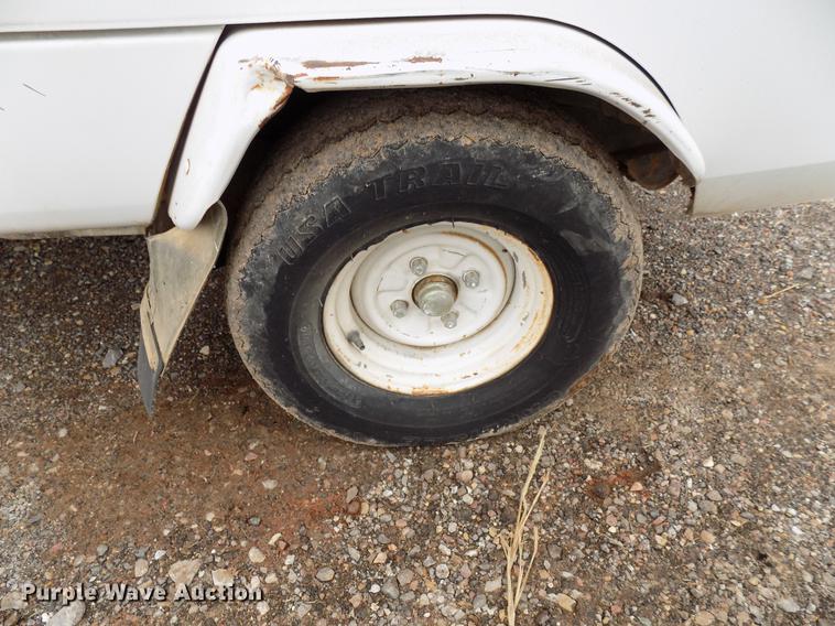 image for item FQ9207 2001 Mitsubishi U14TQHPDL2M flatbed pickup truck