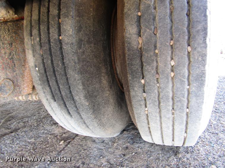 image for item DB6925 1975 Fruehauf drop deck equipment trailer