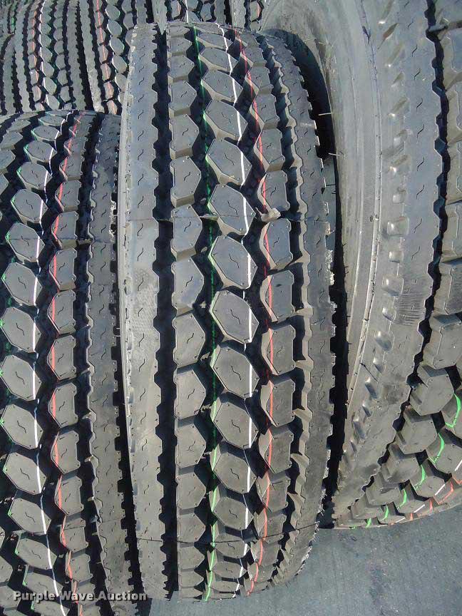 image for item G1551 (8) 11R22.5 HS208 closed shoulder drive tires