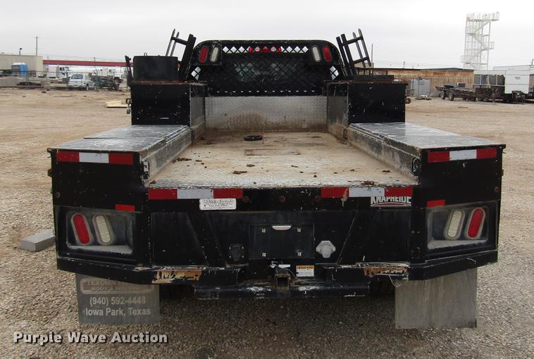 image for item DB6942 2014 Dodge Ram 5500 Crew Cab flatbed truck