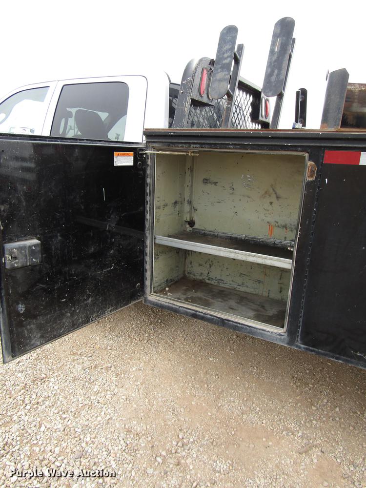 image for item DB6942 2014 Dodge Ram 5500 Crew Cab flatbed truck