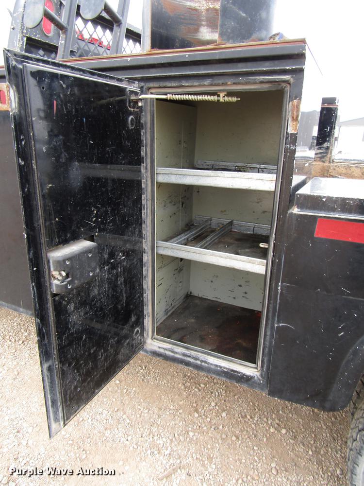 image for item DB6942 2014 Dodge Ram 5500 Crew Cab flatbed truck