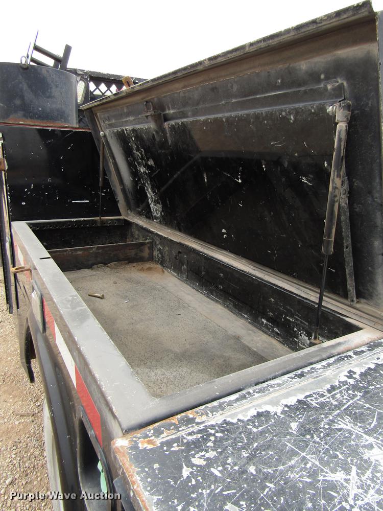 image for item DB6942 2014 Dodge Ram 5500 Crew Cab flatbed truck