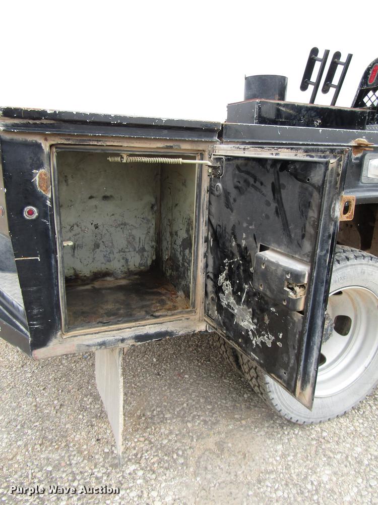 image for item DB6942 2014 Dodge Ram 5500 Crew Cab flatbed truck