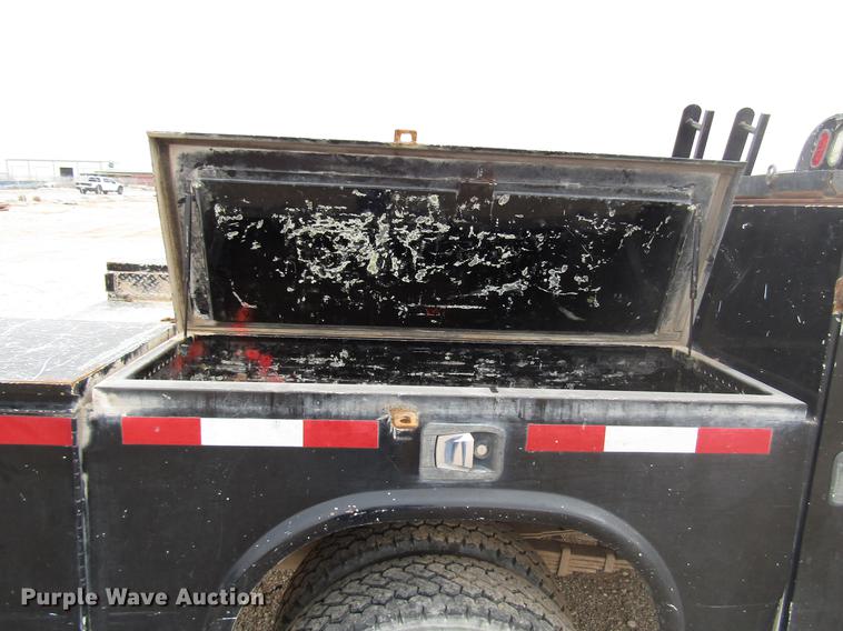 image for item DB6942 2014 Dodge Ram 5500 Crew Cab flatbed truck