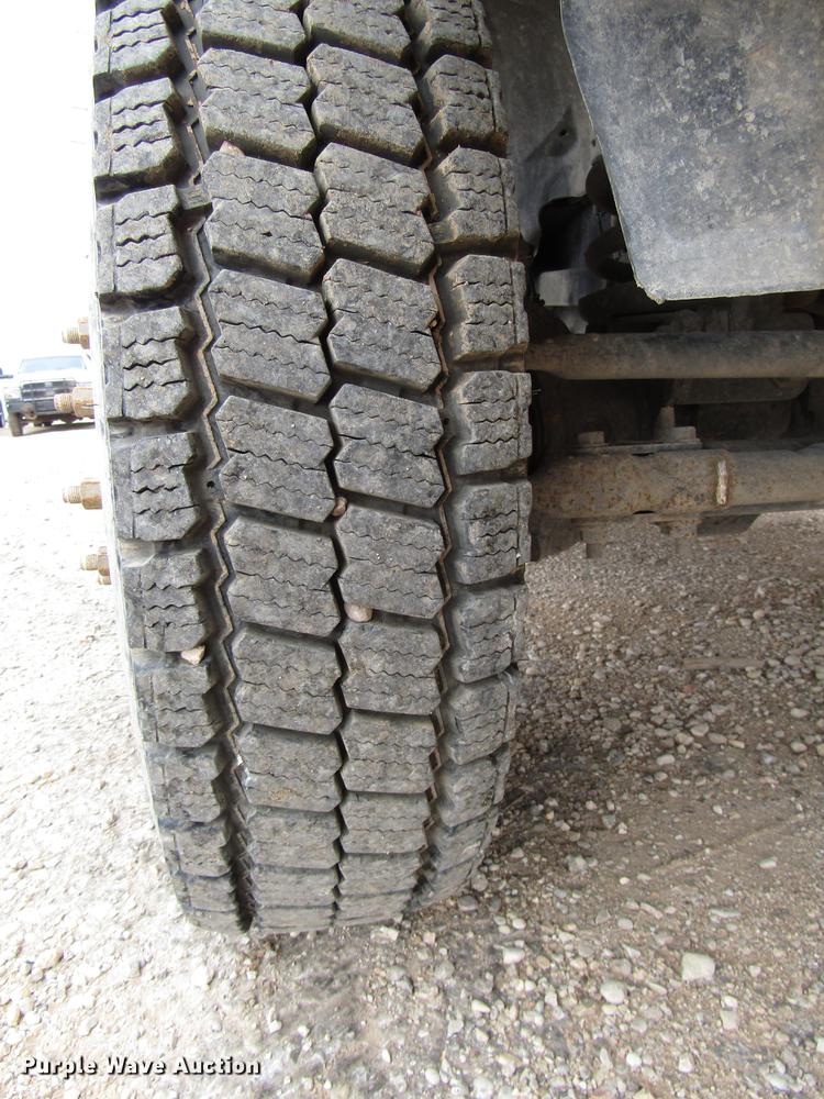 image for item DB6942 2014 Dodge Ram 5500 Crew Cab flatbed truck