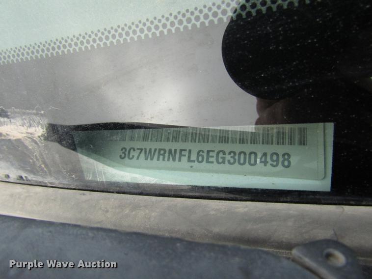 image for item DB6942 2014 Dodge Ram 5500 Crew Cab flatbed truck