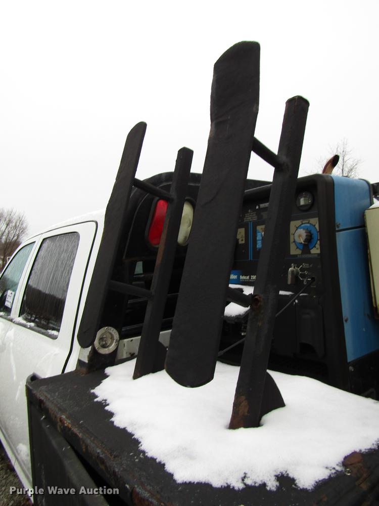 image for item DB6953 2011 Dodge Ram 5500 Crew Cab flatbed truck