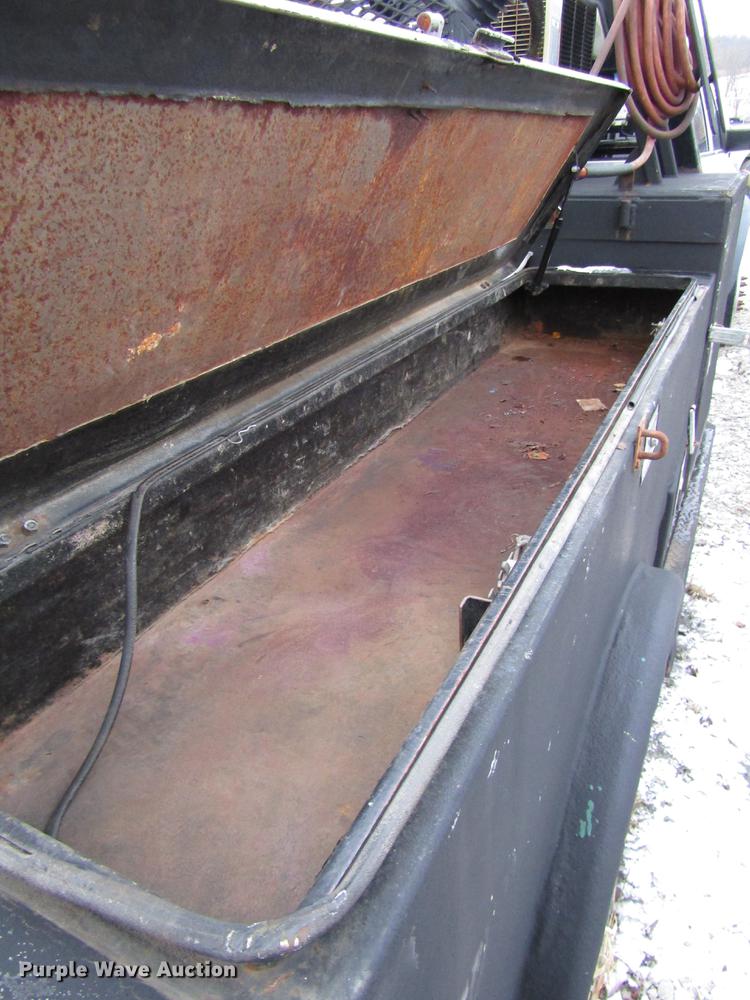 image for item DB6953 2011 Dodge Ram 5500 Crew Cab flatbed truck