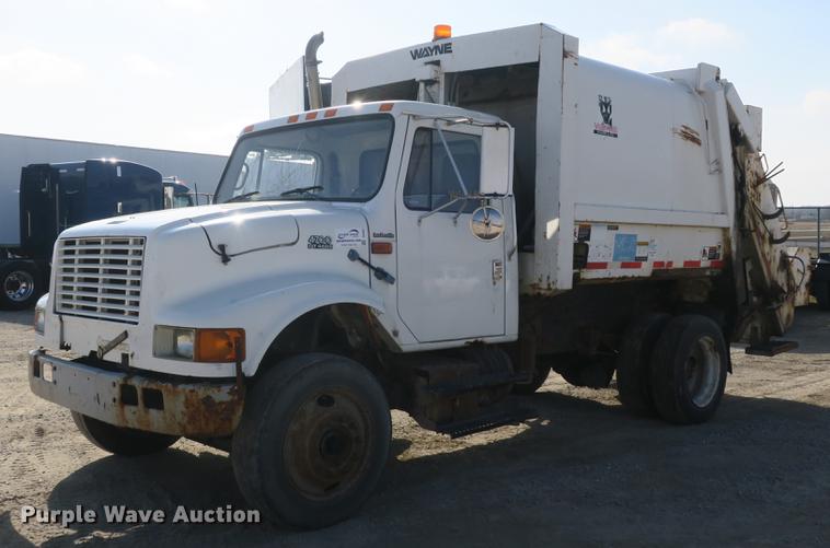 image for item DB8903 2000 International 4700 refuse truck