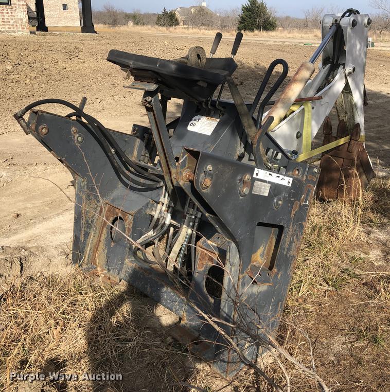 image for item DC0185 Melroe 709 skid steer backhoe attachment