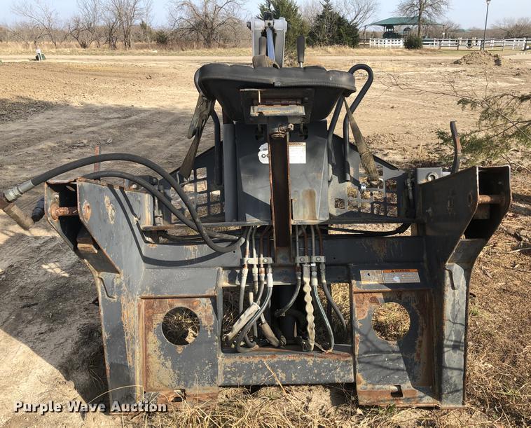 image for item DC0185 Melroe 709 skid steer backhoe attachment